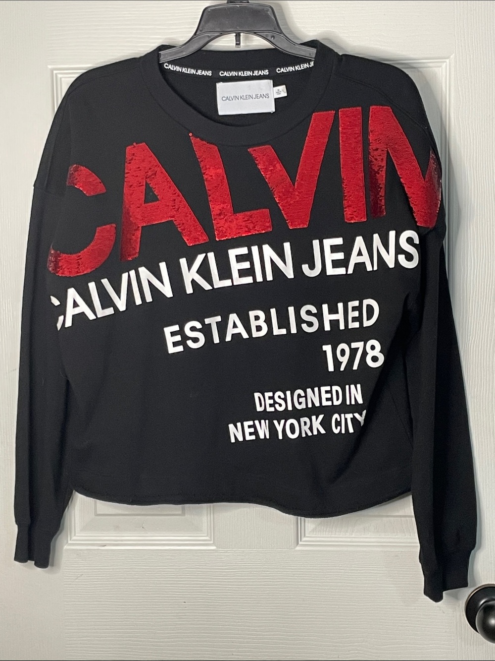 Calvin Klein Jeans Black Sweatshirt with Red and White Logo. Size M